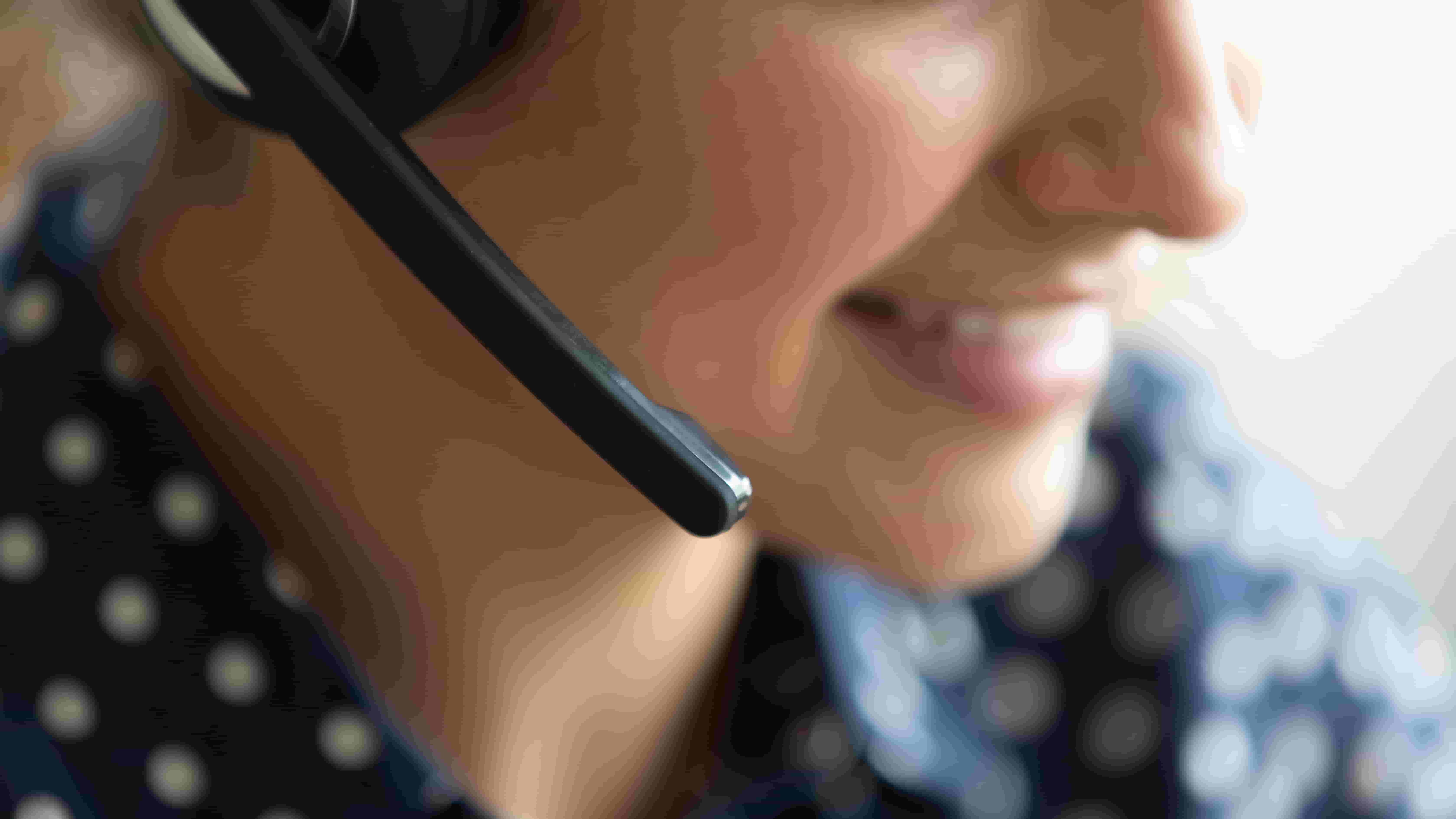 A closeup of a headset microphone
